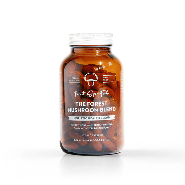 Mushroom Blend Capsules in amber jar featuring organic whole food blend with Lions Mane, Reishi, and Chaga mushrooms